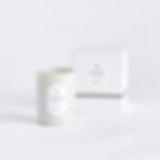 white silvergrass candle with box packaging on a table