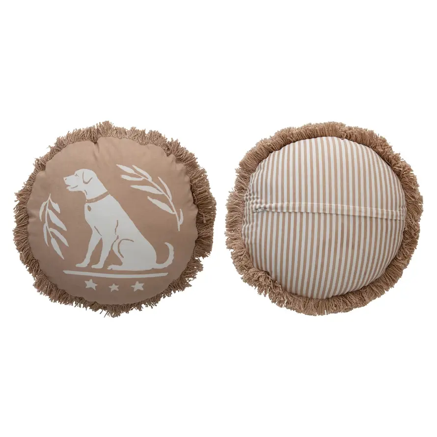 Round throw pillow with cute dog with leaves and stars surrounding it