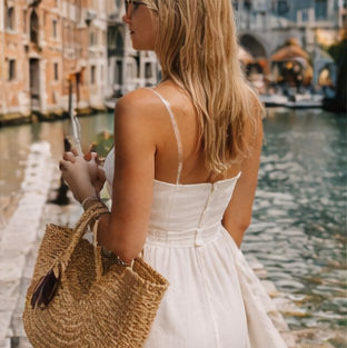 woman dressed in white dress in italy