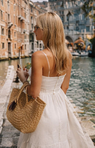 woman dressed in white dress in italy