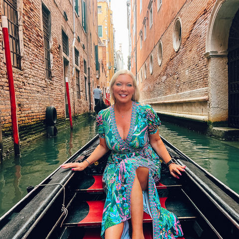 woman on gondola in venice italy