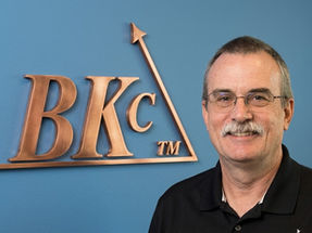 bill kelton with the logo