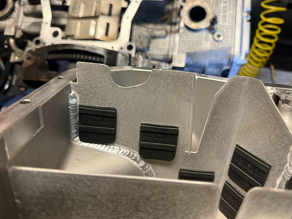 A small section of a baffle plate needed to be filed for the sump to fit