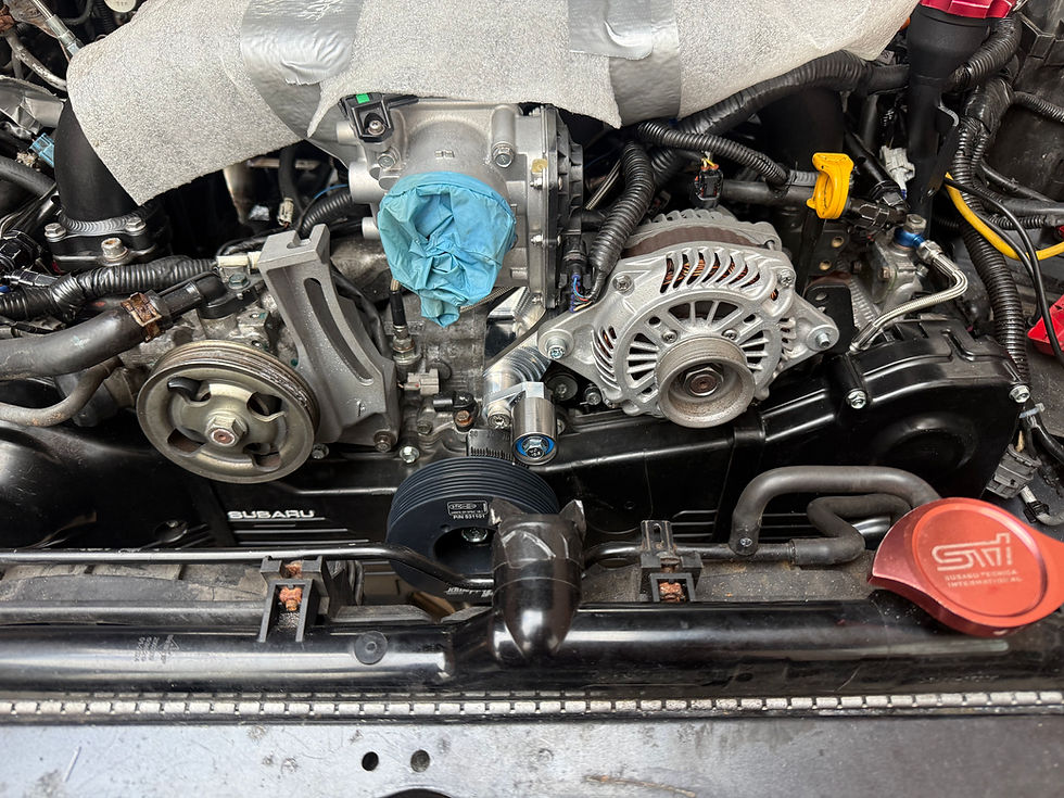 The clearance between the alternator and throttle body connector is just about adequate!