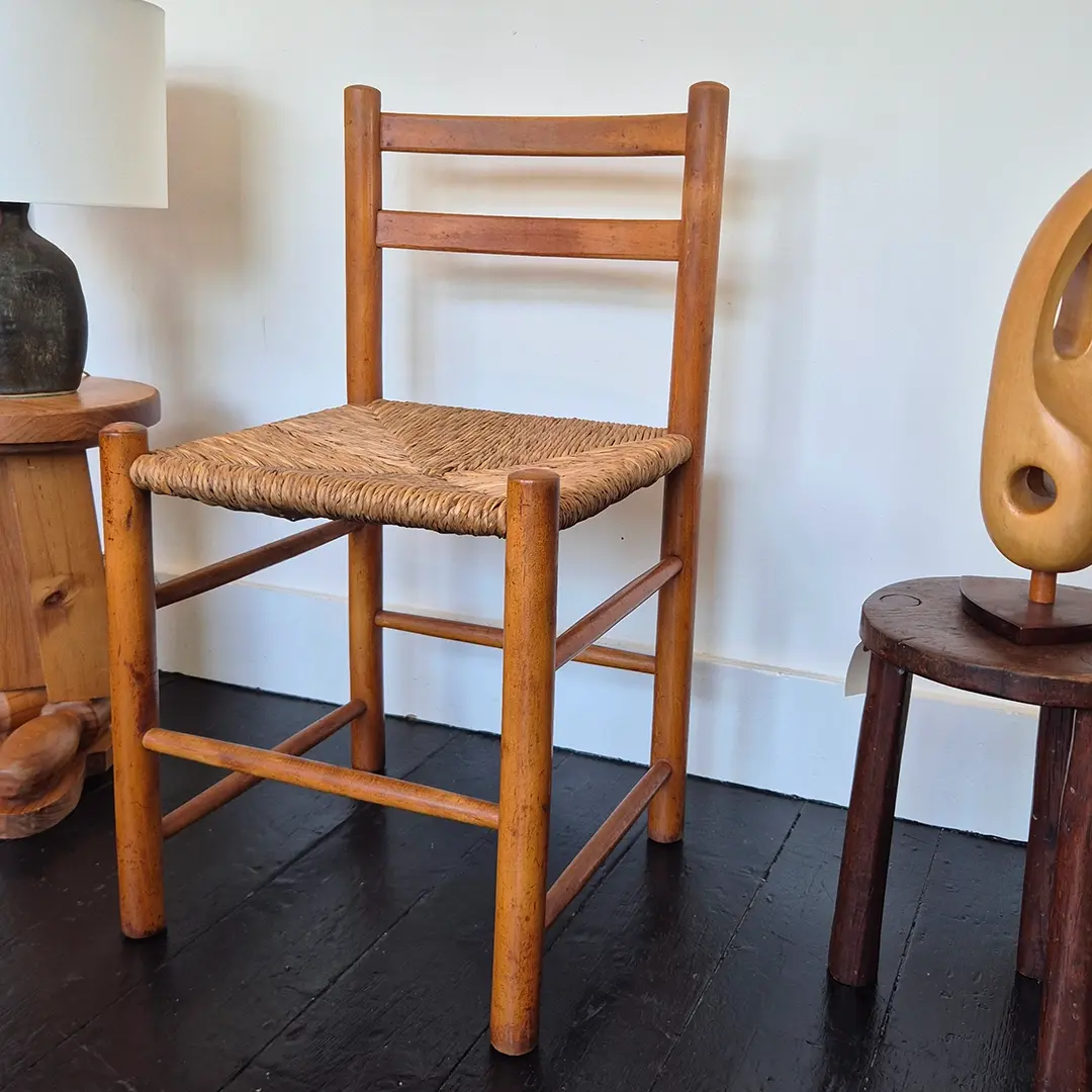 French rustic wooden chair with woven rush seat (side view)