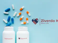 White pills and capsules scattered on a blue background near white bottles labeled Ivermectin and Ziverdo Kit, with a heart logo and text "Ziverdo Kit Save Life".