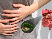 Person clutching stomach in pain, overlaid with digestive system diagram highlighting gallstones. Gray background, medical illustration.