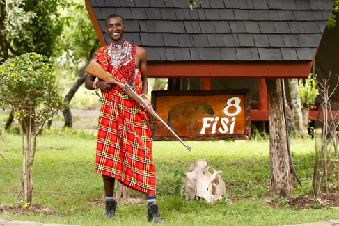Armed Guard at the unfenced Royal Mara. Bob Pool