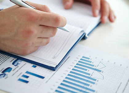 close-up-businessman-writing-summary.jpg