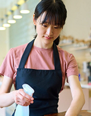 cheerful-cleaner-in-overalls-cleaning-office-desk-w1xlmuj9zk7s490de0 1.png