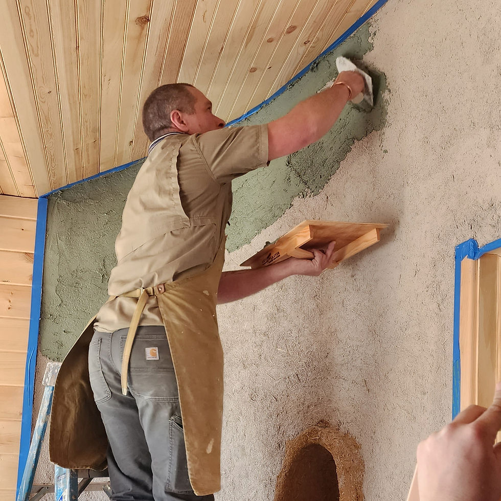 Artisan Gabriel Franklin demonstrates clay plaster