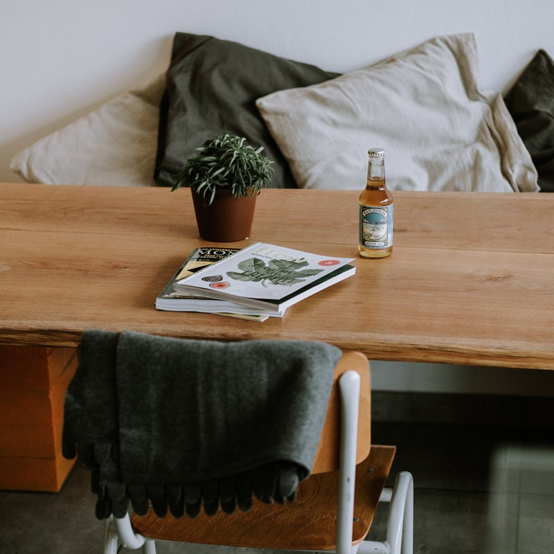 sofa chair beer magazines