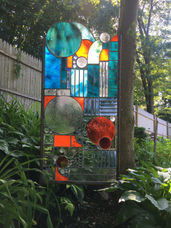 Many of the sculptures include mirrored glass. 