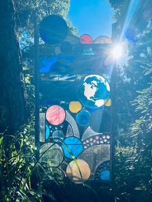 The glory of sun kissing the sculptures and bringing the colors of glass to life.