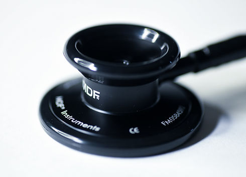 a close up of a black object on a white surface_edited.jpg