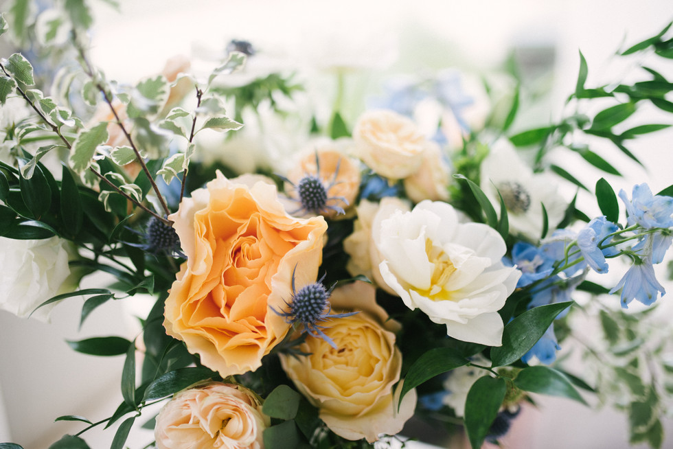 peach flowers in floral arrangement