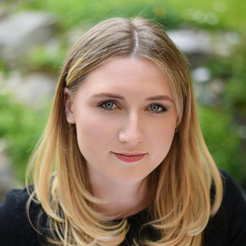 Woman with blonde hair, headshot
