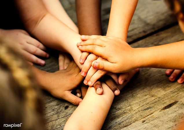 children stacking hands.jpg