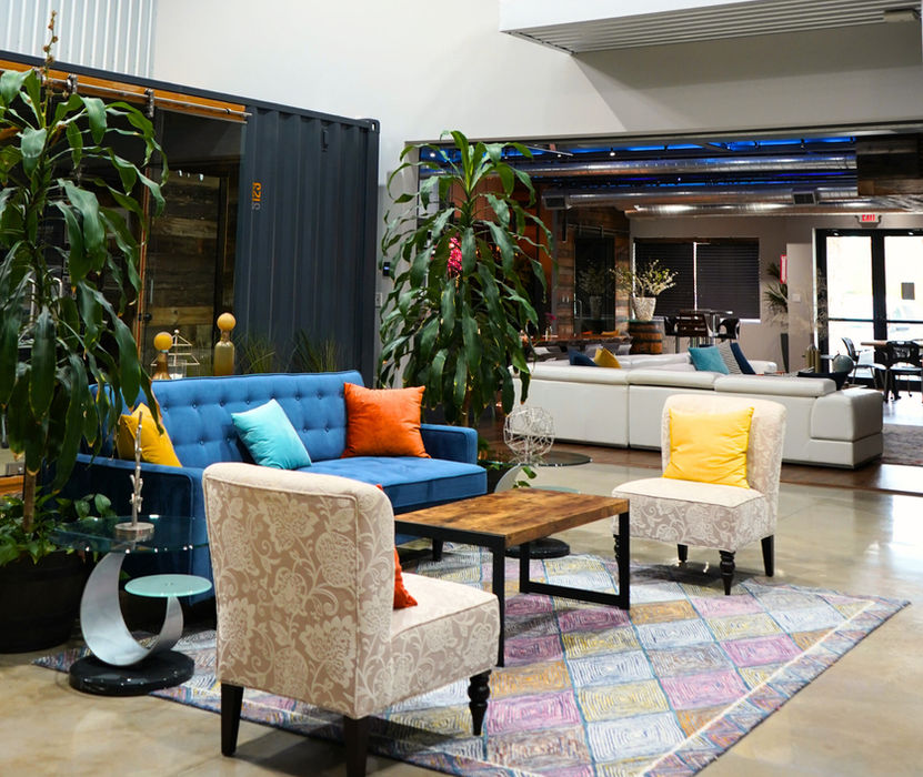 Coworking lounge and shared workspace amenities at Cubic Cowork in Spring, TX