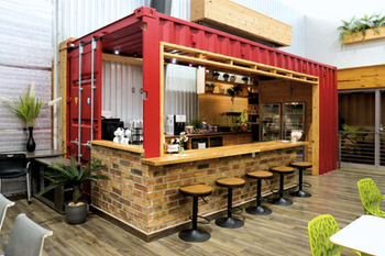 Coworking lounge and shared workspace amenities at Cubic Cowork in Spring, TX