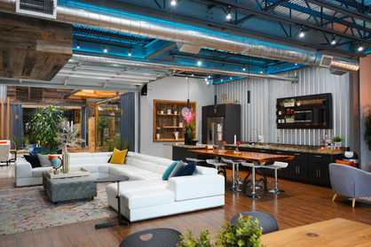 Coworking lounge and shared workspace amenities at Cubic Cowork in Spring, TX
