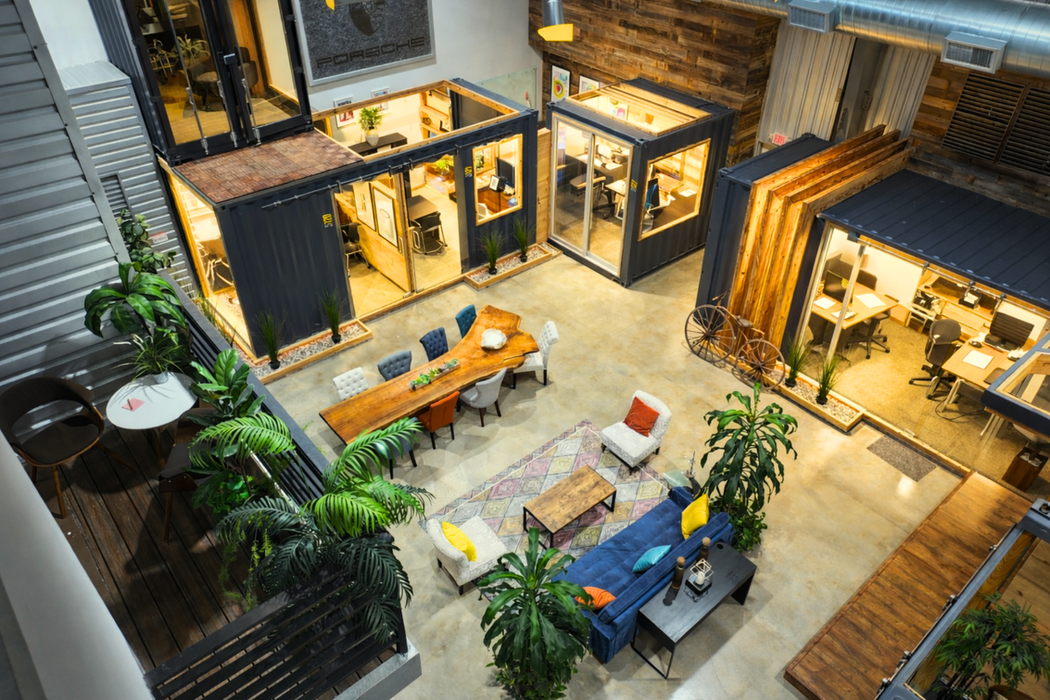 Coworking lounge and shared workspace amenities at Cubic Cowork in Spring, TX