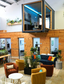 Coworking lounge and shared workspace amenities at Cubic Cowork in Spring, TX
