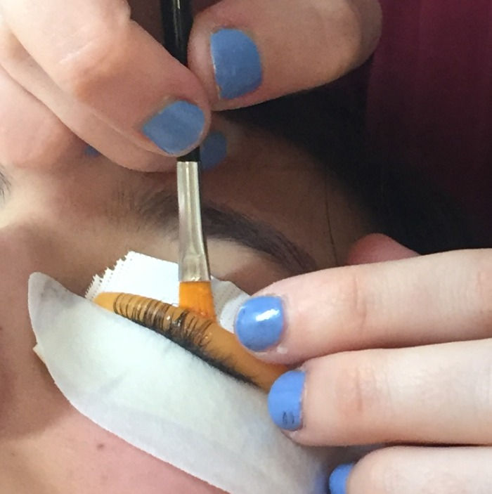 Lashes being adhered to Lash Lift shield