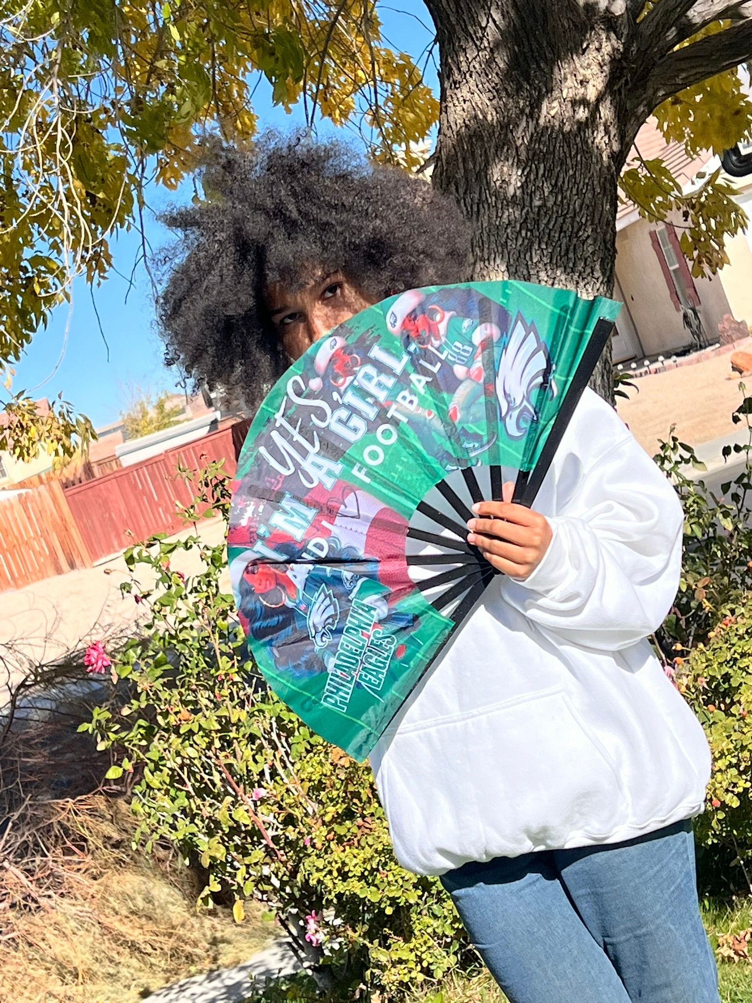 Philedelphia Eagles Green Clack Fan Covering Face