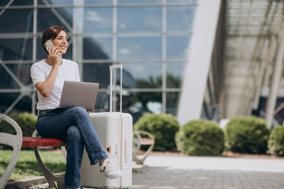 woman-travelling-working-computer-airport.jpg