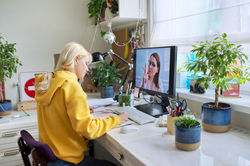 girl-teenager-studies-sitting-at-home-using-comput-2023-11-27-05-36-14-utc