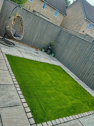 Centered artificial garden with grey Kandle grey flags