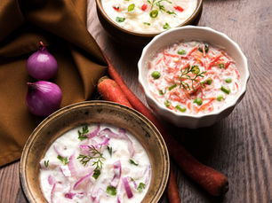 Let’s be honest—when the pakoras are hot, the chaat is spicy, and the chutneys are tangy little flavor bombs, you need someone to keep it all together. That someone is raita. Raita doesn’t shout. It doesn’t demand attention. It just sits quietly on the side of your plate, chillin’, ready to step in when your mouth’s on fire or your palate needs a breather. It’s the cucumber water of Indian condiments—but better, creamier, crunchier, and actually delicious. And the best part? It takes five minutes, one bowl, and very little brain power.