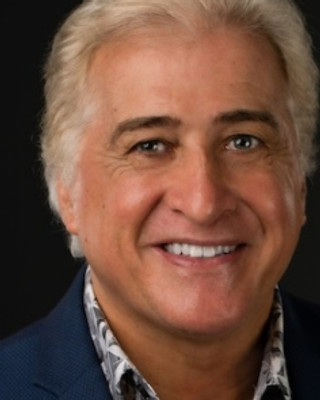 Headshotwname 4-20.jpg