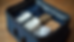 Eye-level view of neatly packed suitcase with UK boarding school essentials