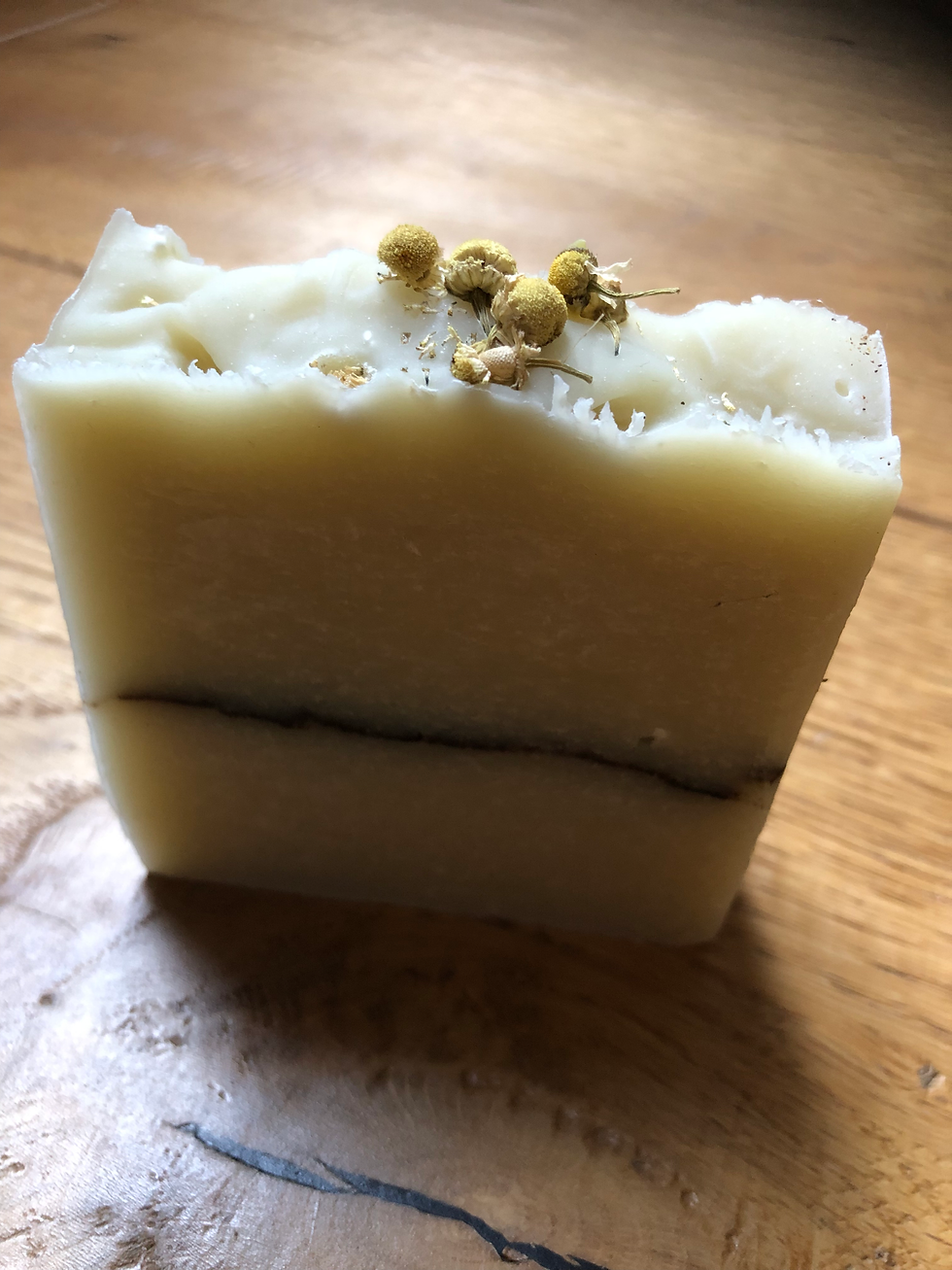 Thumbnail: Chamomile topped creamy coloured soap bar.
