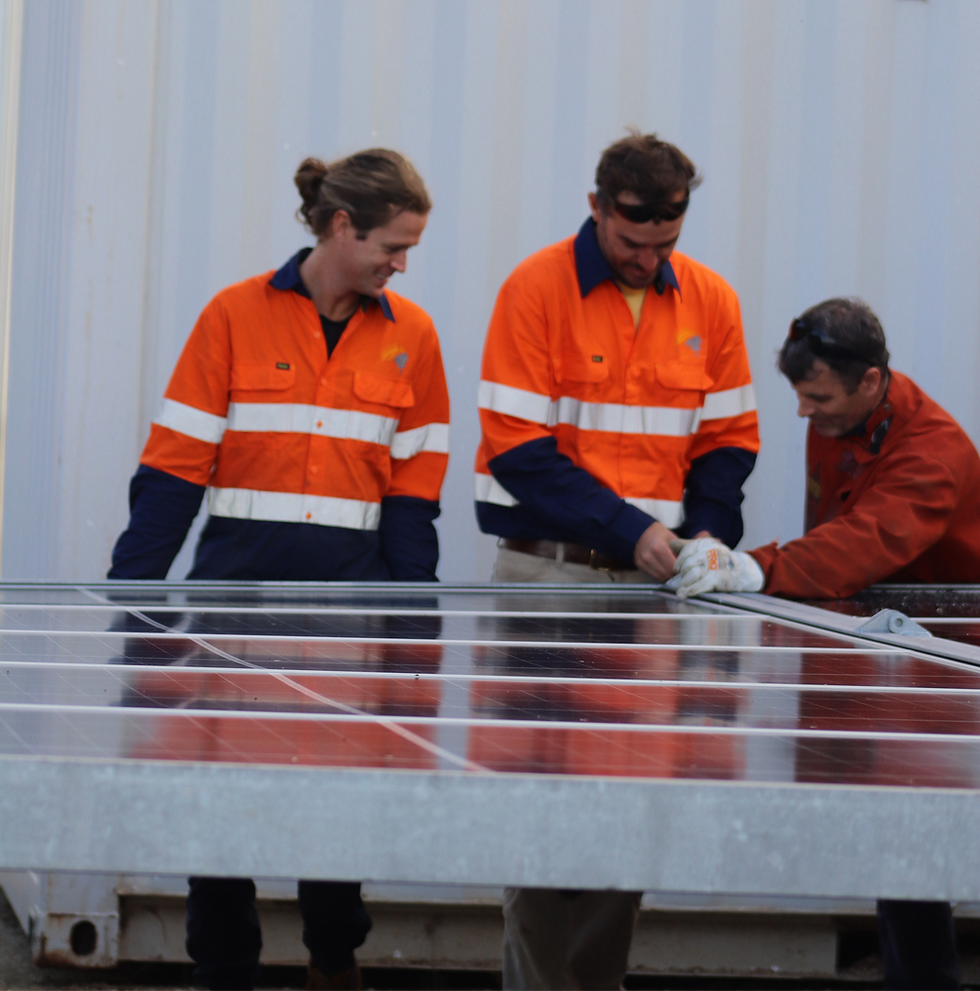FPS20-20 hybrid power system with solar panels supplying temporary power at a remote construction site.
