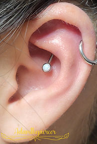 Adam ear piercing2