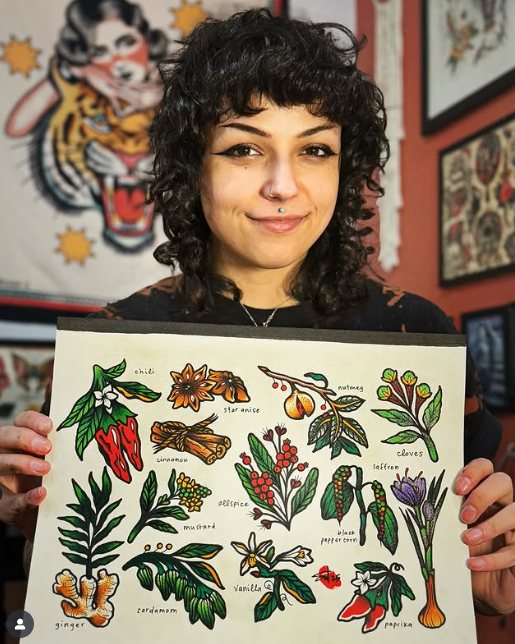 Sabrina with her tattoo flash