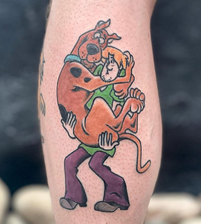 Cartoon tattoo by mike