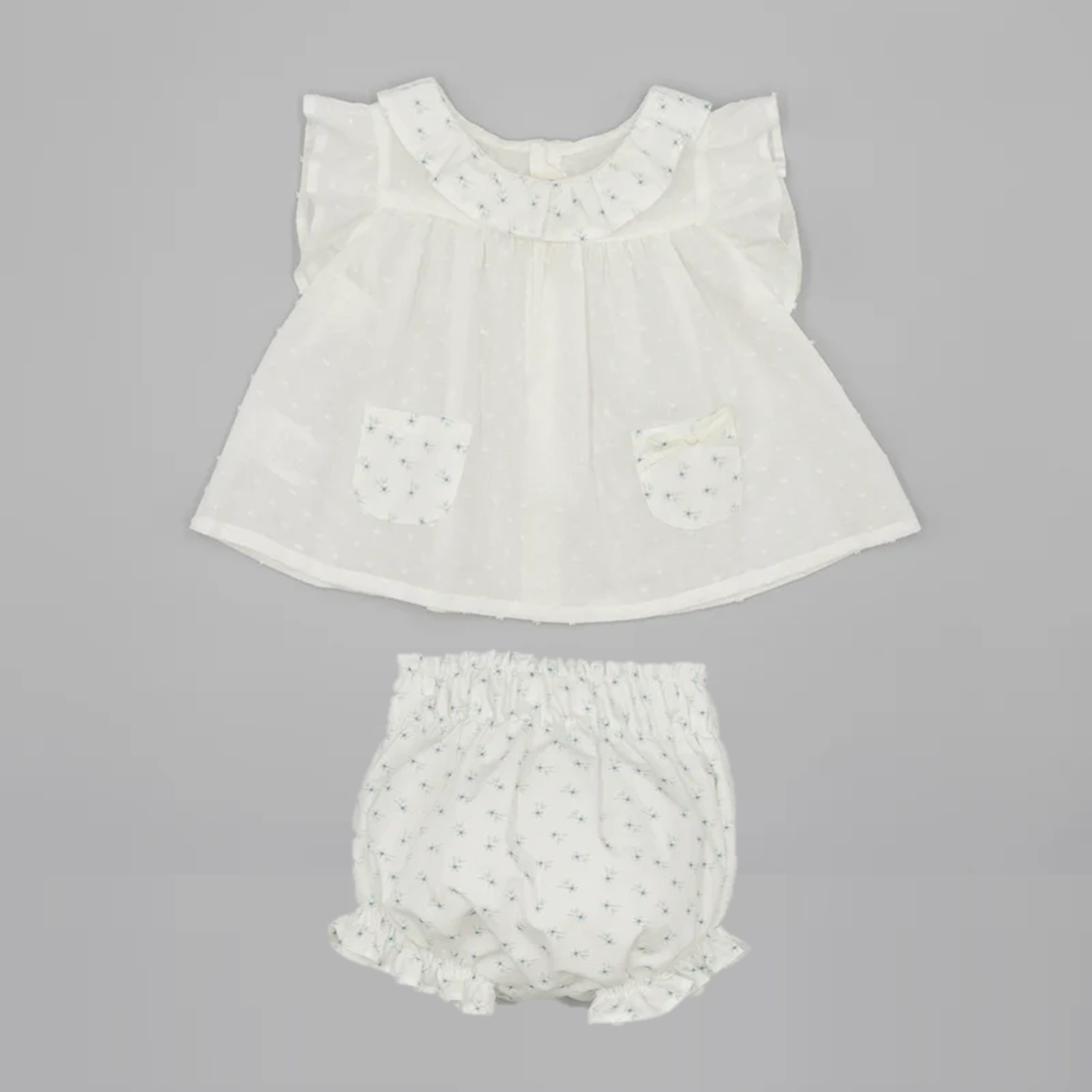 BLUSA BEBÉ PLUMETI CON BOLSILLOS Y RANITA ESTAMPADO FLORAL
