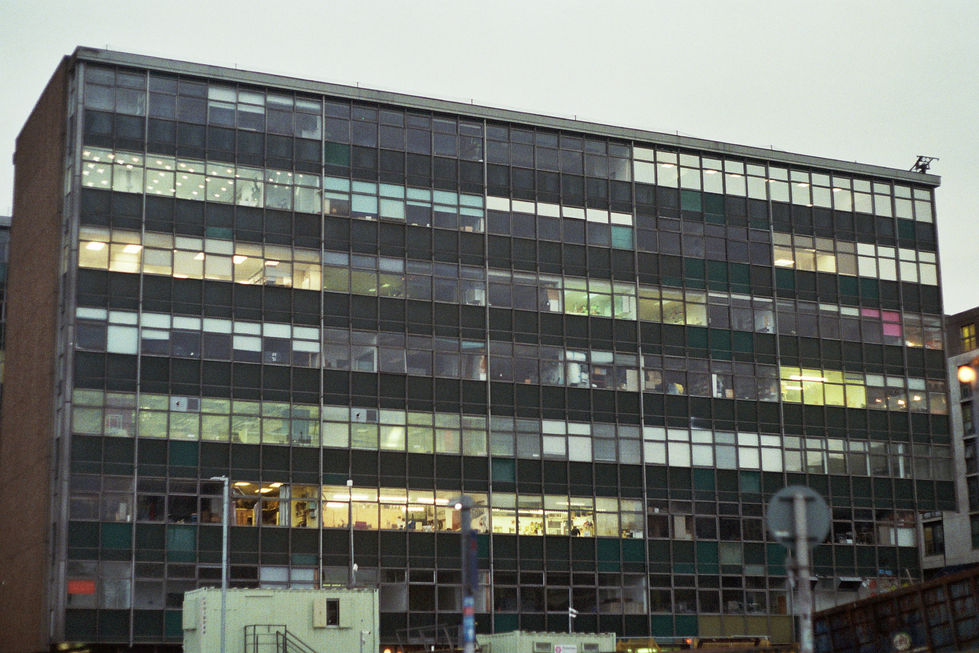 Office building with large glass windows. Wojciech J Walkowicz