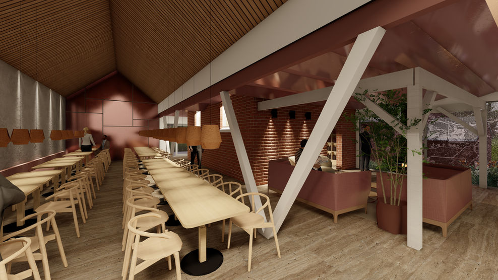 Wide view of dining hall and lounge area under vaulted ceiling.