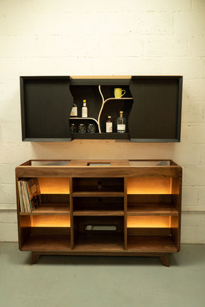 A bespoke HiFi cabinet with vinyl storage in solid walnut