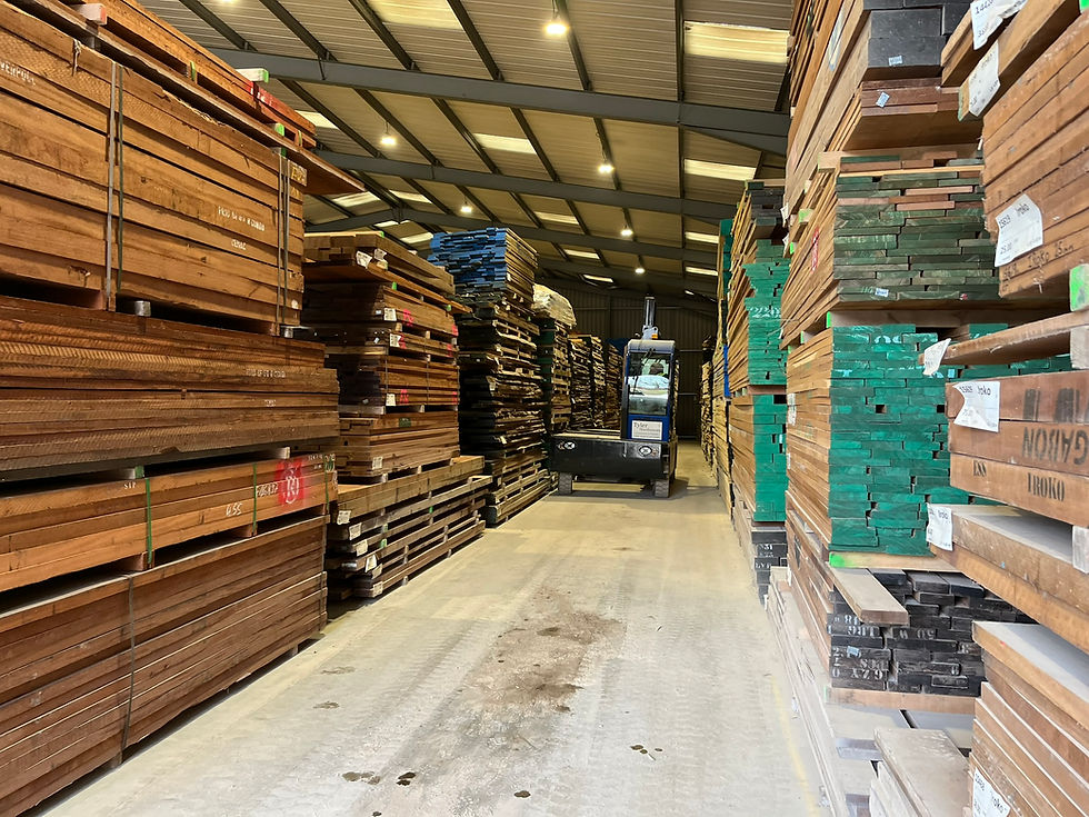 Stacks of timber at the yard ready for use in custom record player cabinets and vinyl storage furniture.