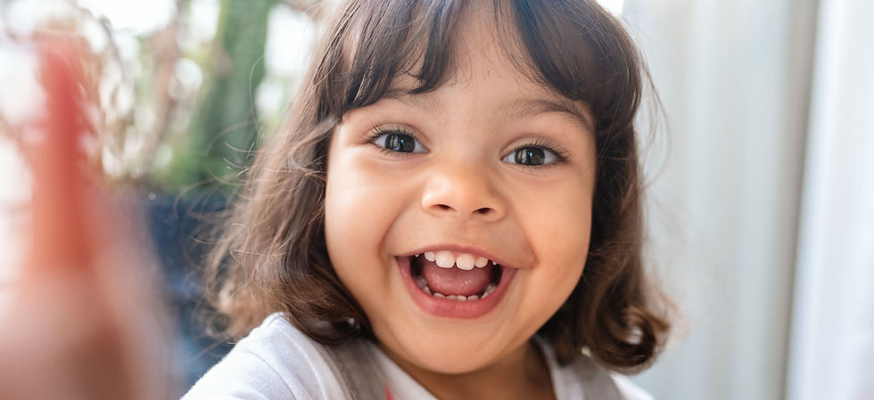 A child laughing at a joke