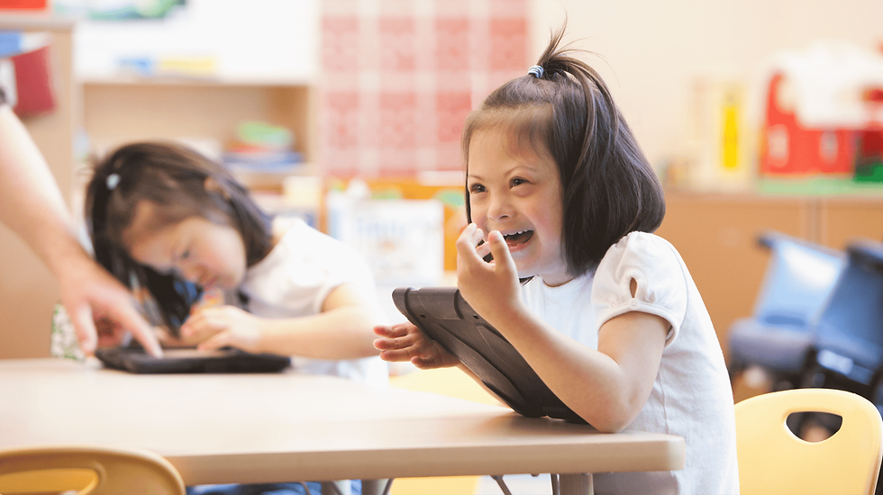 A child laughing in school.