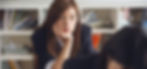 A girl experiencing APD symptoms at school.