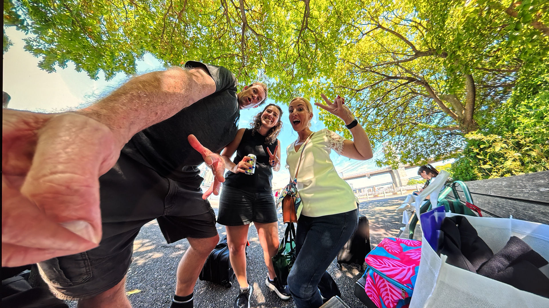 Corporate video production crew from Hill Tribe Productions sharing a light moment during an international filming day in the U.S