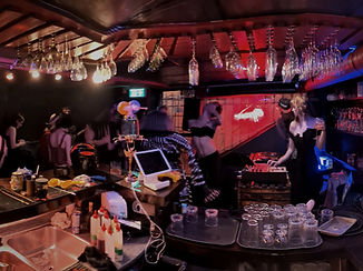 the wych dancing crowd dj booth busy night time party